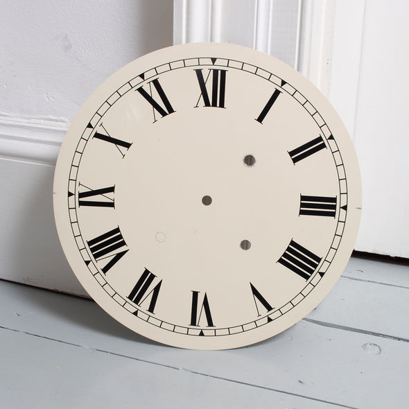 White Clock Face with three holes