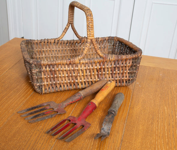 Wicker Basket and Three Garden Tools